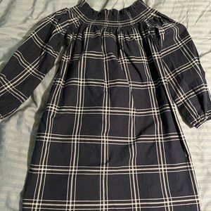 Off the shoulder blue windowpane dress.